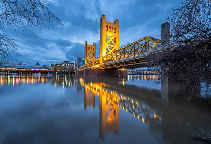 City skyline and Tower Bridge in Sacramento, California where Apex is attending the 2024 CASQA Conference.