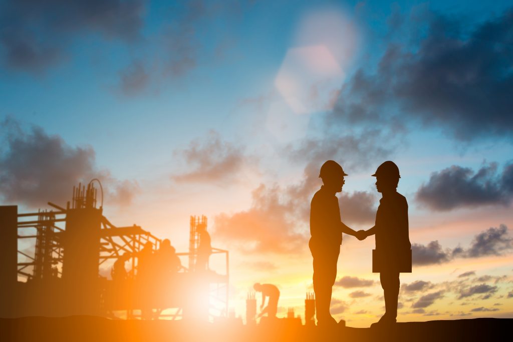 silhouette engineer shake hand silhouette engineer shake hand