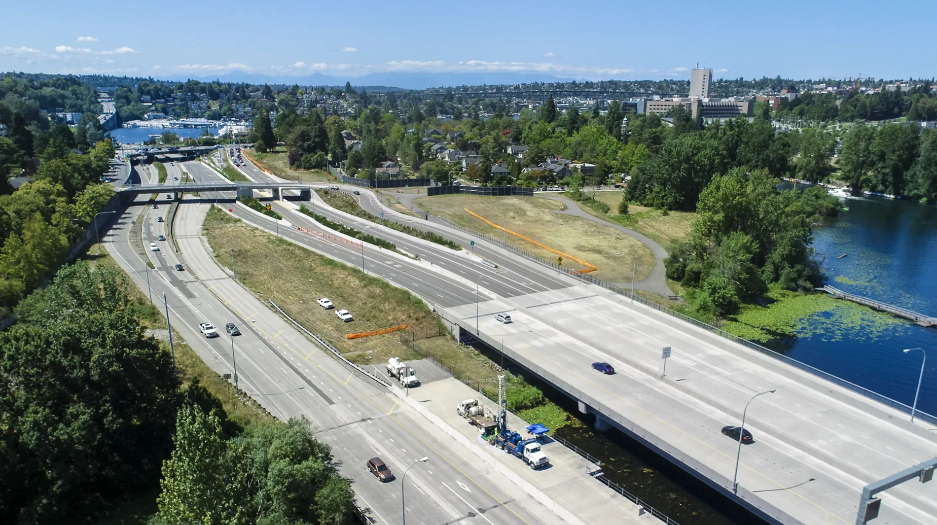 APWA-WA-2025-Fall-Conference-Featured An aerial view of the WSDOT SR520 Montlake to Lake Washington I/C and Bridge Replacement, a project that achieved an APWA National Award.