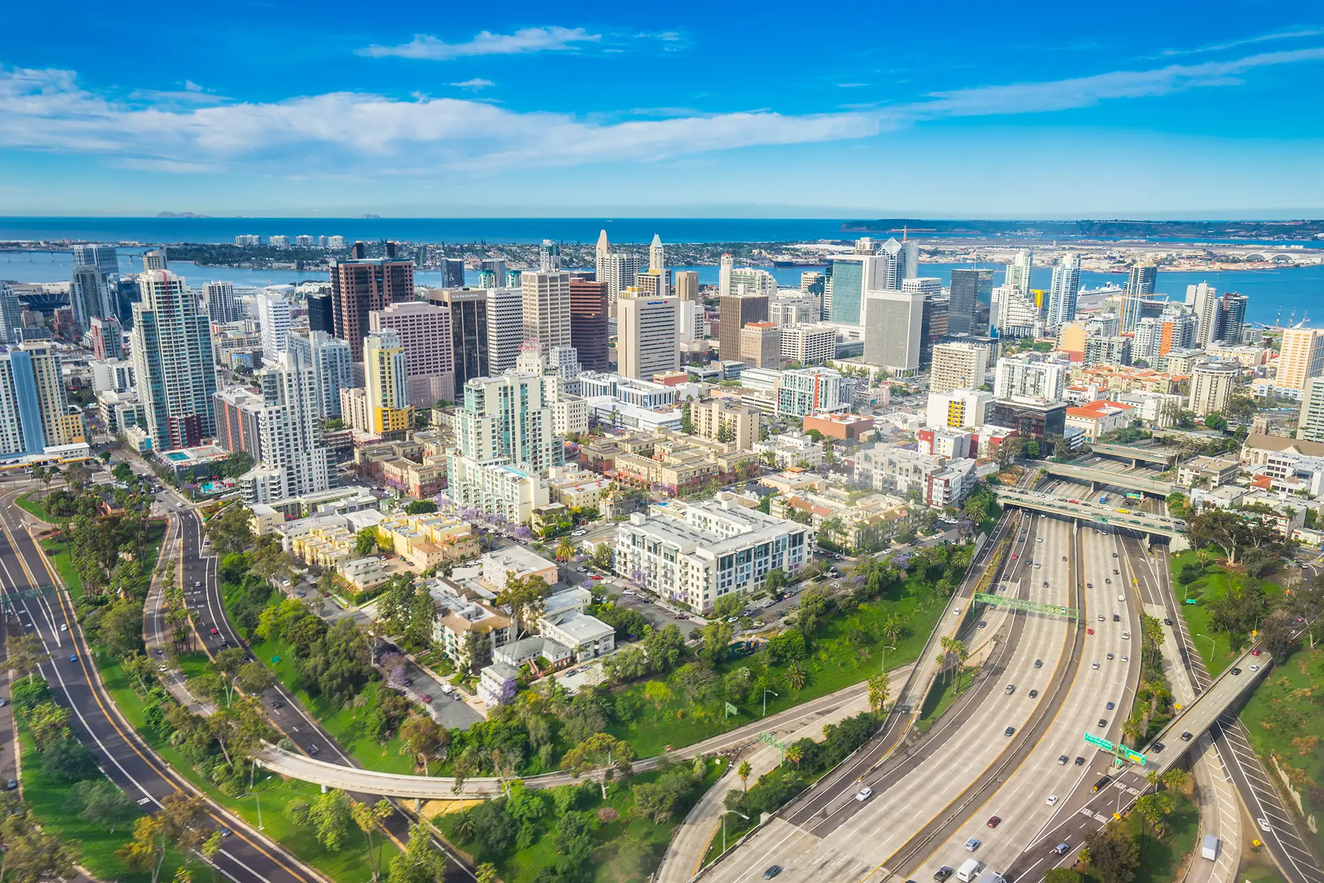 A bird's eye view of the San Diego skyline, where Apex will be a sponsor at the upcoming CalCUPA conference.