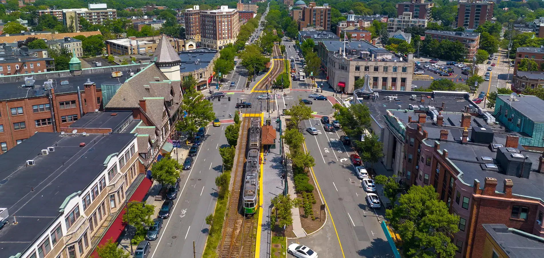 Aerial view of the skyline, subway system, and city infrastructure near Boston, MA.