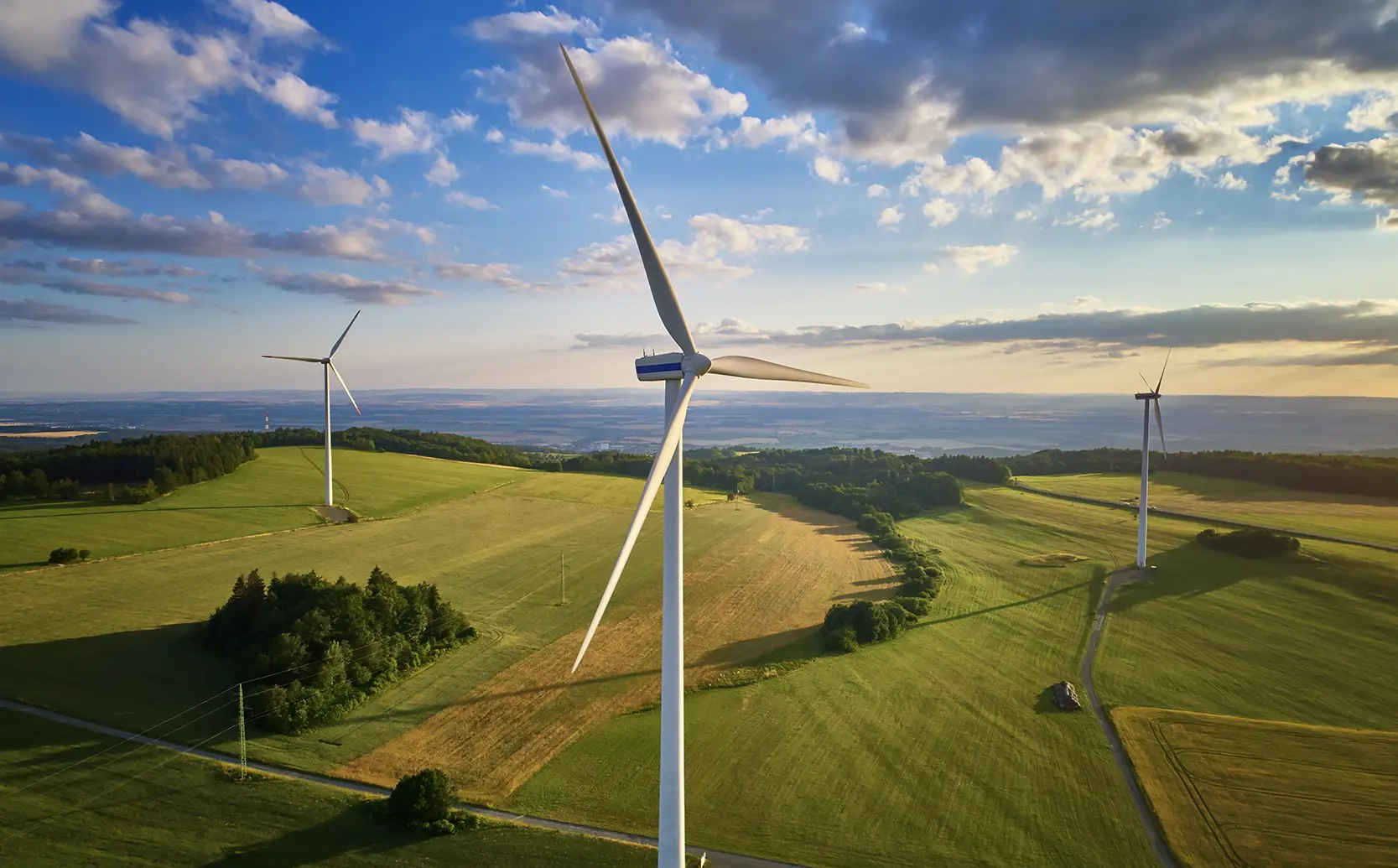 Aerial view of wind turbines at a wind farm where Apex Companies provided renewable energy services