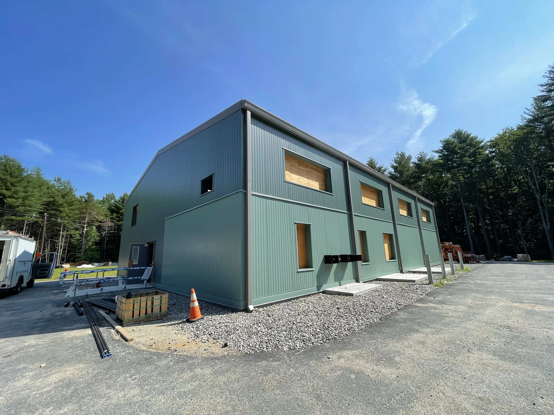 Water treatment system building under construction in Medfield, MA where Apex provided water quality studies and professional engineering services.