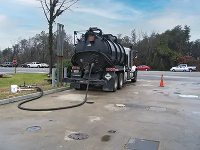 Vacuum truck performing an Aggressive Fluid Vapor Recovery (AFVR) as part of the underground storage tank remediation process